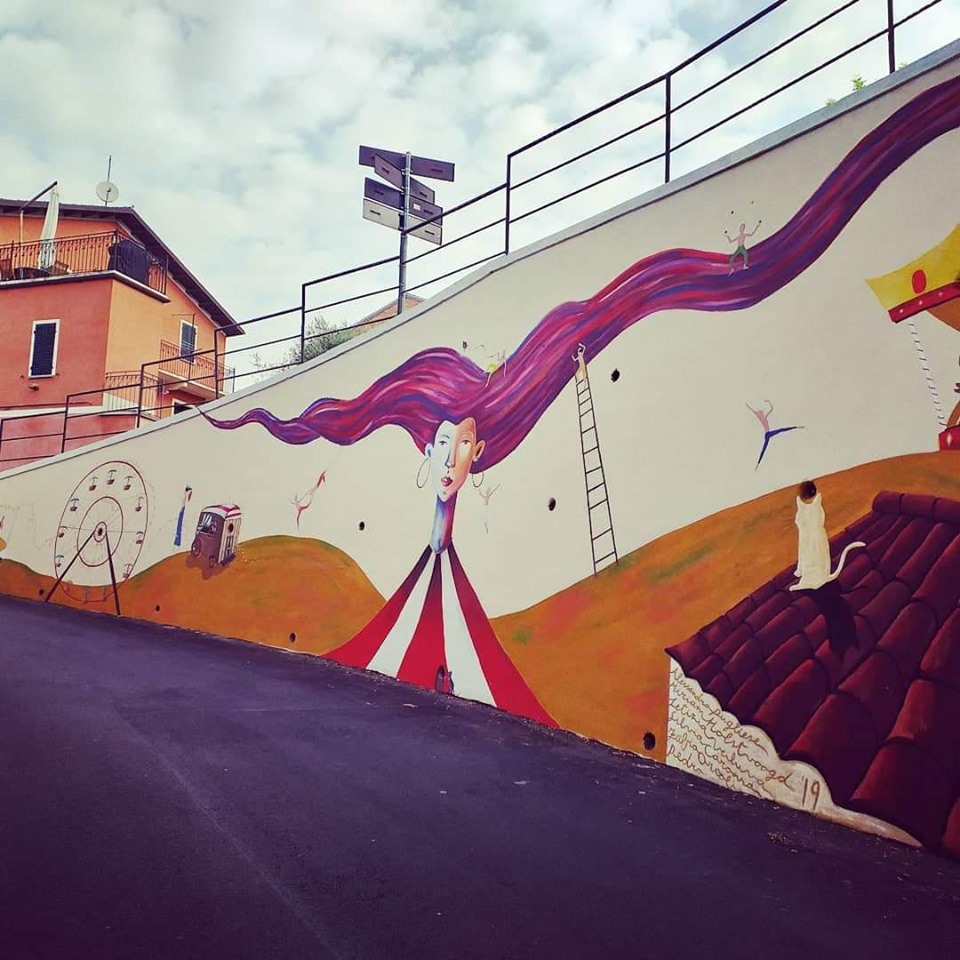 Murale "Chi sono io? Il saltinbanco dell'anima mia"